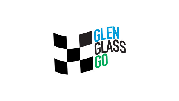 Logo with a black-and-white checkered racing flag design on the left. To the right, stacked text reads ‘GLEN’ in blue, ‘GLASS’ in black, and ‘GO’ in green.