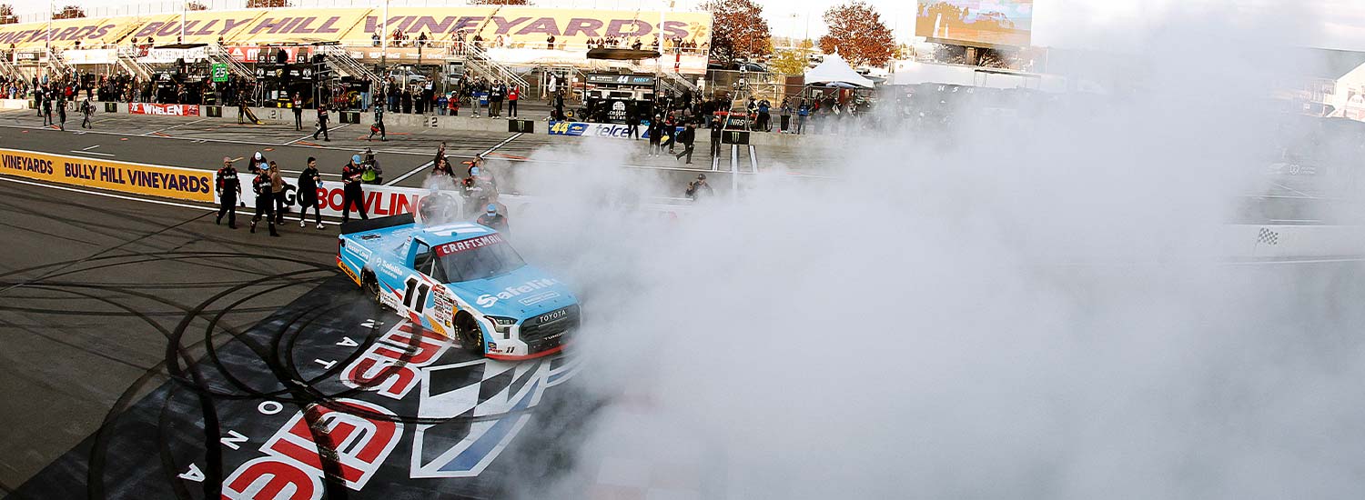 Kaden Honeycutt, driver of the #11 Safelite + Foster Love Toyota, celebrates with a burnout after winning the NASCAR Craftsman Truck Series Bully Hill Vineyards 176 at The Glen at Watkins Glen International on May 08, 2026 in Watkins Glen, New York. (Photo by Sean Gardner/Getty Images)
