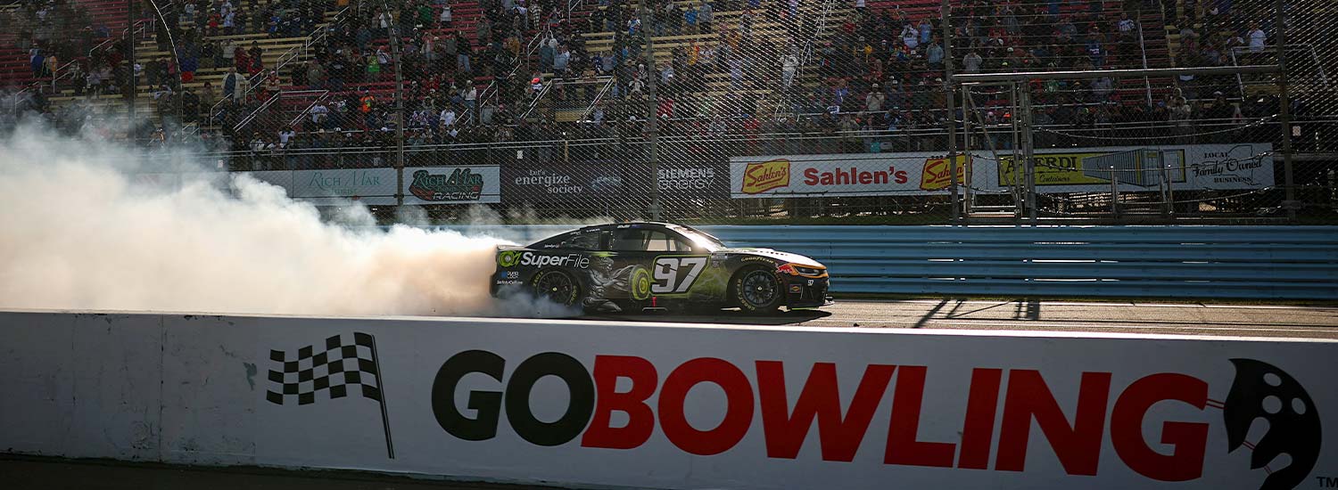 Shane Van Gisbergen, driver of the #97 Superfile Chevrolet, celebrates with a burnout after winning the NASCAR Cup Series Go Bowling at The Glen at Watkins Glen International on May 10, 2026 in Watkins Glen, New York. (Photo by Chris Graythen/Getty Images)